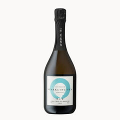A bottle of Sparkling Tea by Copenhagen Tea Company, featuring a dark glass bottle with a black foil capsule and a white label with a light blue circular design.