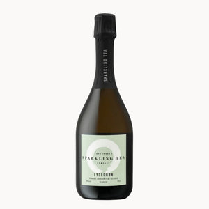 A bottle of Lysegrøn Sparkling Tea Complex from Refreshing, featuring a dark glass bottle with a black foil neck wrap and a pale sage green label.