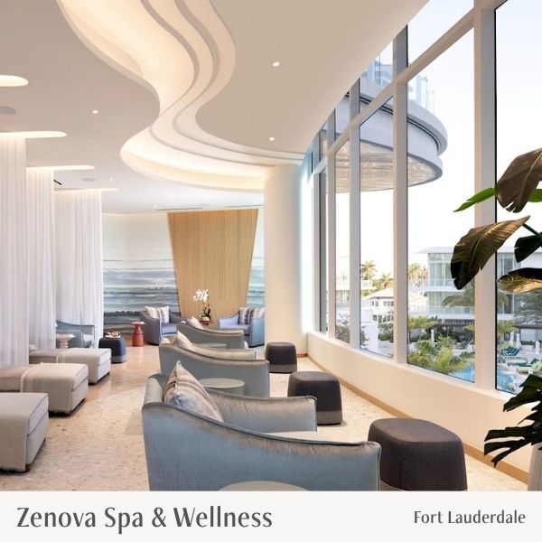 Modern interior of a spa with lounge chairs and large windows, featuring the brand 'Zenova Spa & Wellness'.