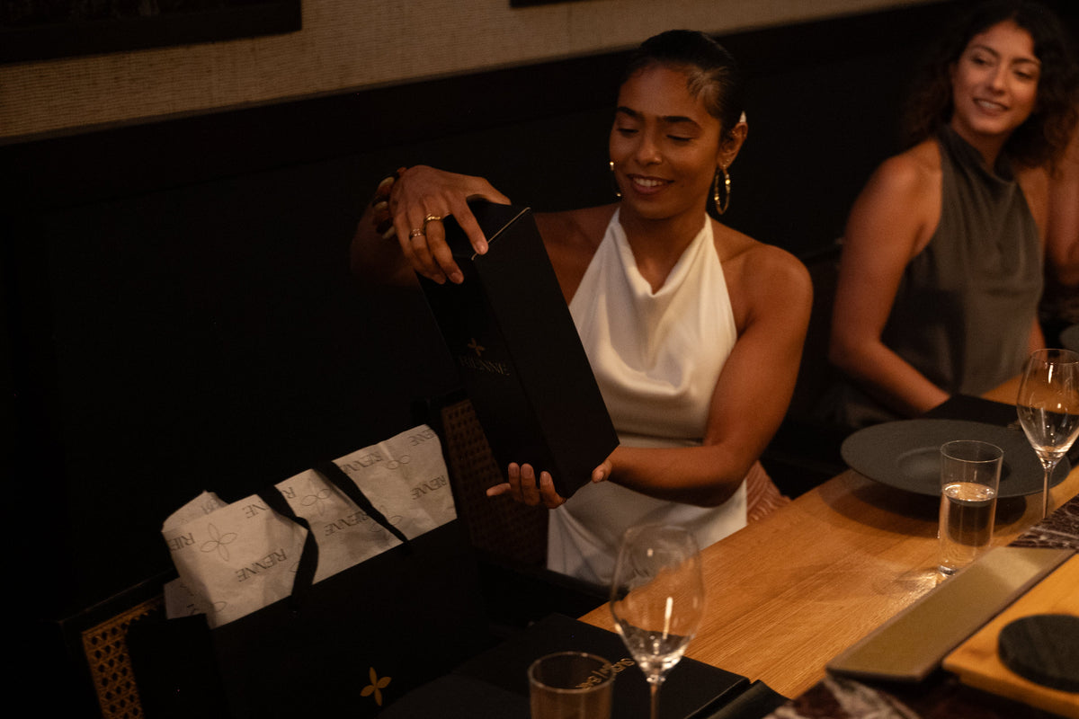 A beautiful lady enjoying a gift from RIENNE