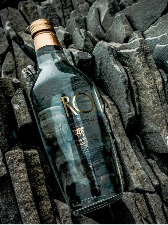 Bottle of ROI Water available at Rienne