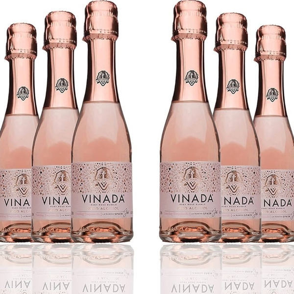 Set of six Vinada rose wine bottles on a white background