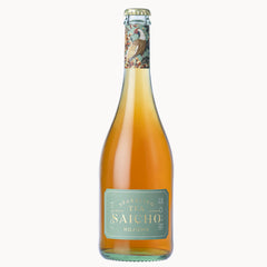 A bottle of Saicho Japanese Hojicha  Sparkling Tea with a light green label and a decorative cap, filled with amber-colored tea, on a solid white background.