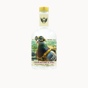 A clear glass bottle of London Botanical Spirit non-alcoholic spirit, featuring a colorful label of a pigeon wearing aviator goggles and a harness, with a gold cap and a cream-colored neck label.
