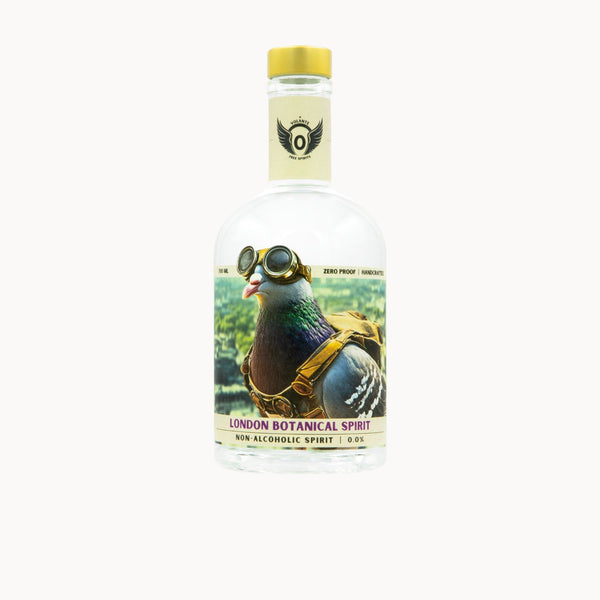 A clear glass bottle of London Botanical Spirit non-alcoholic spirit, featuring a colorful label of a pigeon wearing aviator goggles and a harness, with a gold cap and a cream-colored neck label.