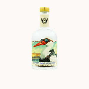 A clear glass bottle of Eastern Clear Grain Spirit non-alcoholic spirit, featuring a vintage-style label with an illustration of a white bird wearing goggles and a yellow cap, on a light gray background.