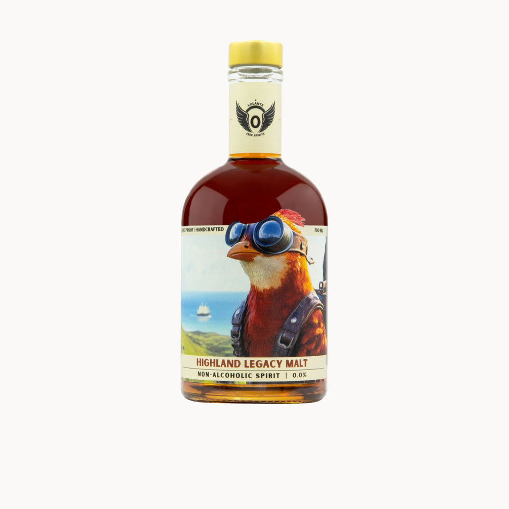 A bottle of Highland Legacy Malt non-alcoholic spirit, featuring a label with a detailed illustration of a bird wearing goggles, on a solid white background.