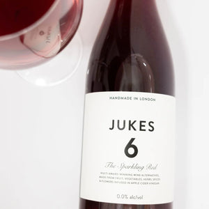 Close-up of the JUKES 6 The Sparkling Red label at RIENNE, wine alternative made from fruit, herbs and apple cider vinegar, 0.0%
